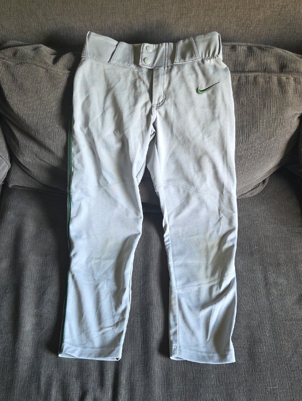 Nike White Youth Baseball Pants with Green Accents